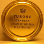 T DENMARK CONTAINS NOT LESS THAN 11 2/3 IMP FL.OZ.